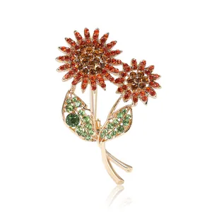 Broche tournesol élégante en alliage doré avec strass orange et verts brillants