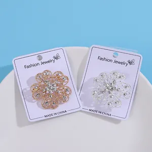 Sparkling rhinestone flower brooches in gold and silver finish with fashion card