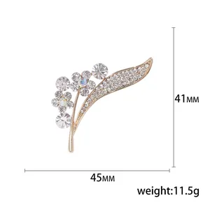 Elegant gold-tone plant flower brooch with sparkling rhinestones, 45mm floral jewelry accessory