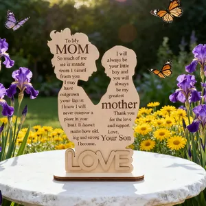 Detail of wooden mother and child silhouette ornament with laser engraved poem and love base