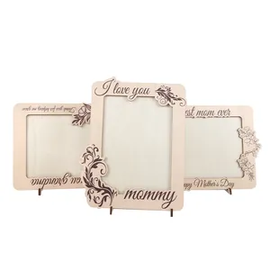 Detail of wooden Mother's Day photo frames with intricate floral laser-cut carvings