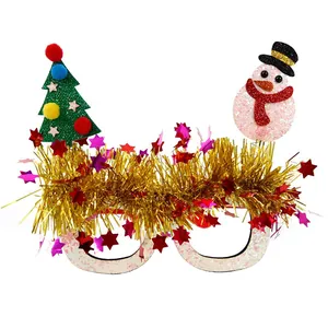 Close-up of Christmas glasses with green sequin tree and snowman on white background