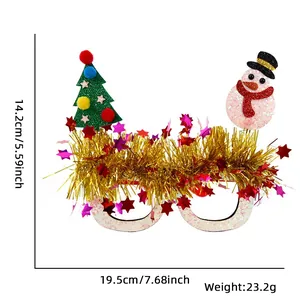 Christmas party glasses with glittery pink frame, snowman and tree with gold tinsel decor