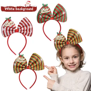 Christmas glitter bow headbands with Feliz Navidad gold script for kids party decor