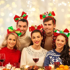 Group of models wearing diverse Christmas headbands with reindeer, Santa and bows decoration