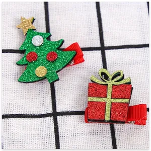 Grazioso set di fermagli natalizi con albero glitterato verde e scatola regalo rossa