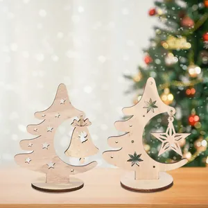 Laser-cut wooden Christmas tree ornaments with moon and star details on round bases