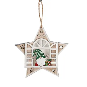 Star-shaped wooden Christmas ornament with a festive gnome and gift box design