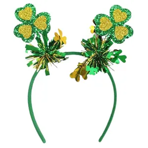 Green St. Patrick's Day headband with glitter shamrock and metallic gold fringe