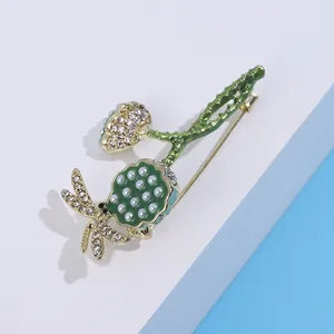 Exquisite gold lotus dragonfly brooch with green enamel and sparkling rhinestones