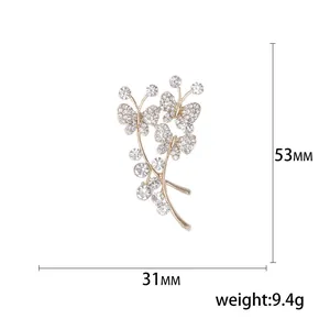 Broche bouquet papillon doré avec cristaux de strass, taille 53mm par 31mm