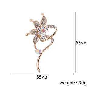 Elegant gold flower brooch with white rhinestones and AB crystals, 63mm high