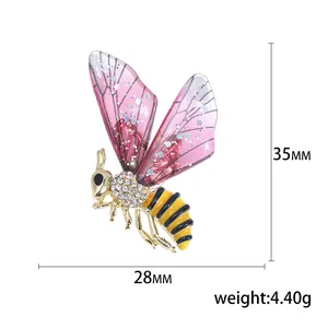Broche abeille scintillante avec ailes pailletées mauves et cristaux, 35x28mm