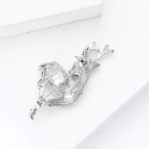 Detailed back view of silver deer brooch featuring rotating pin clasp and rhinestones