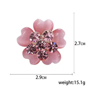 Elegant pink crystal flower brooch with dimensions 2.9x2.7cm and gold base