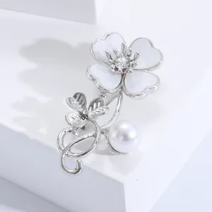 Elegant silver shell flower brooch with white petals, zircon center and round pearl