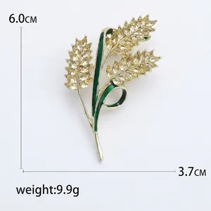 Spilla spiga di grano dorata con cristalli gialli e smalto verde, altezza di 6,0 cm