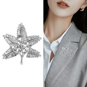 Baroque maple leaf brooch in silver alloy with sparkling rhinestones for elegant suits
