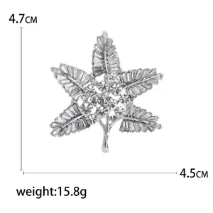 Baroque style crystal maple leaf brooch in silver finish, dimensions 4.7cm by 4.5cm