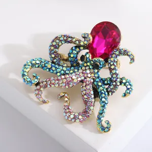Vintage octopus brooch with colorful rhinestones and teardrop rose red gemstone