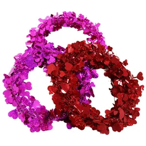 Three-piece set of red, pink, and purple metallic heart-shaped tinsel wreaths for Valentine's Day