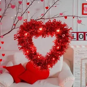 Red heart-shaped Valentine's wreath with warm LED lights for romantic home decor