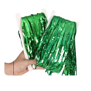Green metallic foil fringe curtain set with laser glitter finish for St. Patrick's Day party