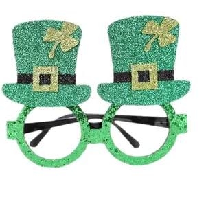 Green glitter St. Patrick's Day party glasses with leprechaun hats and shamrock details