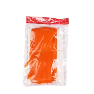 Bright orange tinsel foil fringe curtain for party backdrops in retail packaging