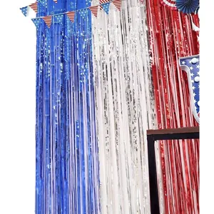 Red white and blue foil fringe curtain backdrop with star pennant banner for party decor