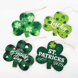 Set of 4 St. Patrick's Day clover wood ornaments with lucky patterns and twine