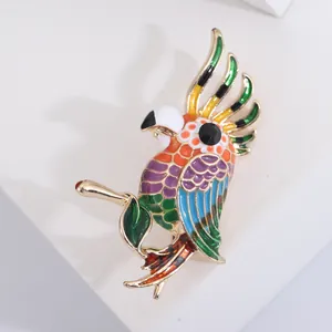 Colorful enamel parrot bird brooch pin in gold-plated alloy with black gemstone eye