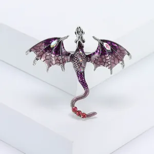 Fantasy winged dragon brooch with purple gradient enamel and colorful rhinestones