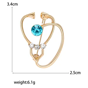 Broche stéthoscope dorée avec cristaux bleus, épingle médicale élégante de 3,4 cm