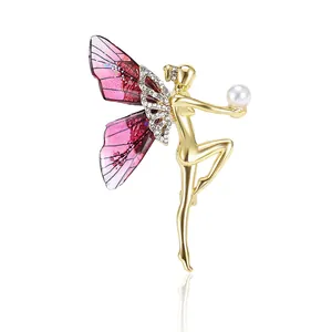 Élégante broche fée papillon dorée avec ailes en émail rose et perle brillante