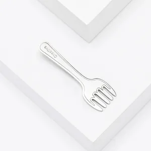 Creative stainless steel fork brooch pin with polished silver finish and engraving