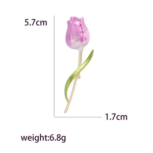 Elegant gold tulip brooch with pink enamel petals and green leaves, 5.7cm size