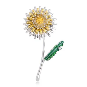 Broche pissenlit minimaliste en or et argent avec une feuille en émail vert
