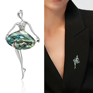 Elegant silver ballet dancer brooch with iridescent abalone shell and sparkling crystals