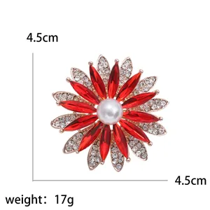Broche tournesol en cristal avec pétales rouges et centre perle, diamètre 4,5 cm