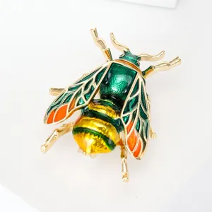 Exquisite golden honey bee brooch with green and yellow enamel wings for suits