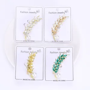 Detailed view of wheat spike brooches in four colors with crystal rhinestones and pearls