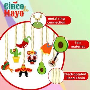 Detail of Cinco de Mayo necklace showing felt cactus and guitar charms on a gold bead chain