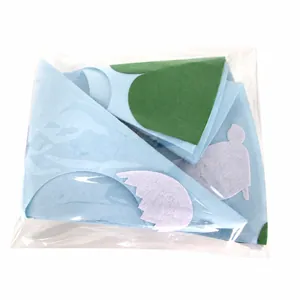 Weight measurement of 112.7g for the blue and green Easter felt party decoration set