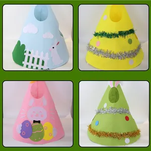 Detailed view of four colorful felt Easter pet houses with rabbit and egg decorations
