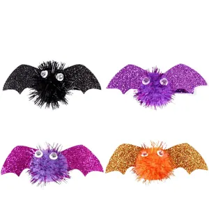 Set of four glitter bat hair clips with pom-poms and googly eyes for Halloween parties