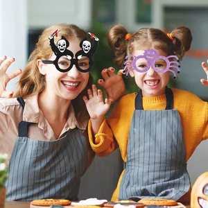 Women and child wearing spooky skull and monster Halloween party glasses for festive fun