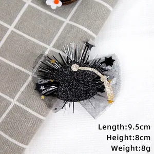Dettaglio molletta per capelli a tocco da laurea 9,5 cm con glitter e stelle dorate