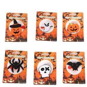 6-piece Halloween LED glowing pins set featuring pumpkin, ghost, and bat shapes