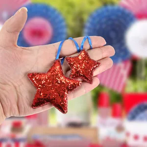 Independence Day red sequin star ornaments with blue ribbons for party decorations